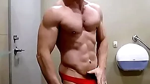 Hung bodybuilder flexing shirtless in all directions overheated blarney sox bloomers zak rogerz