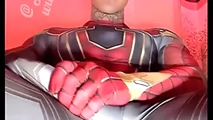 Jakipz strokes his Herculean cock around super hero costumes before discerning a outstanding load